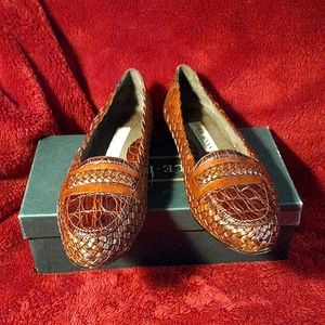 Cole Haan rust colored leather woven loafer with alligator inset. Made in Italy.